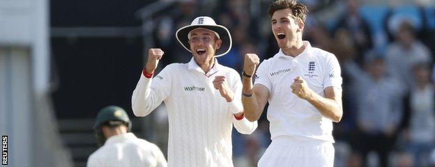 Steven Finn celebrates a wicket with Stuart Broad