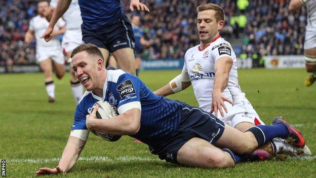 Rory O'Loughlin runs in Leinster's first try despite Paul Marshall's efforts