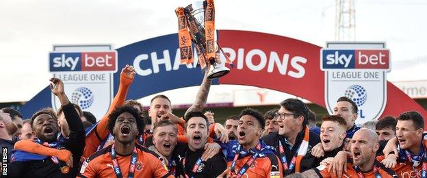 Luton celebrate winning the League One title