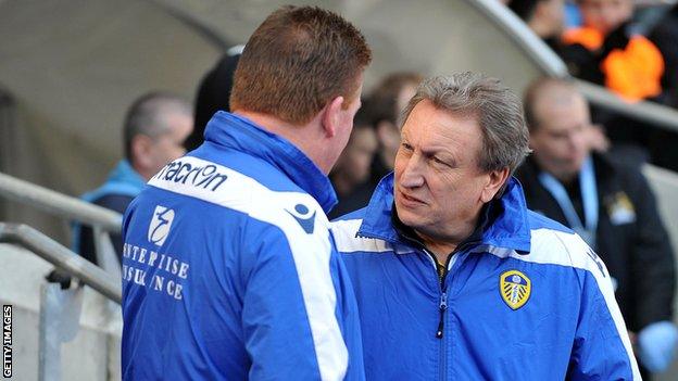 Ex-Leeds United manager Neil Warnock talks to assistant Mick Jones