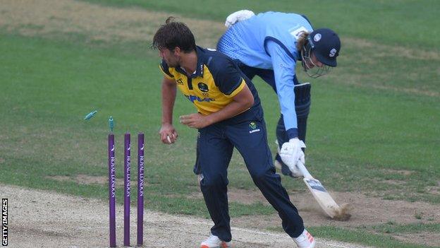 Northamptonshire's Freddie Heldreich is run out by Lukas Carey