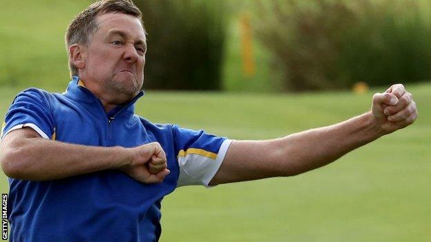 Ian Poulter celebrates beating Dustin Johnson in the singles at the 2018 Ryder Cup