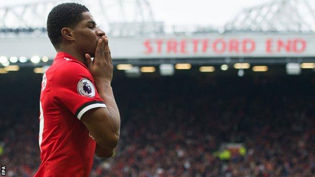 Marcus Rashford celebrates scoring for Manchester United against Liverpool