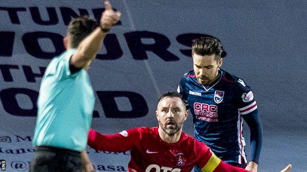 Referee Andrew Dallas with Kris Boyd