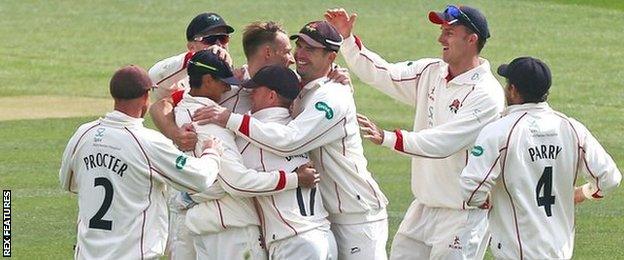 Kyle Jarvis celebrates taking the wicket of Adam Wheater, caught by Haseeb Hameed in the covers