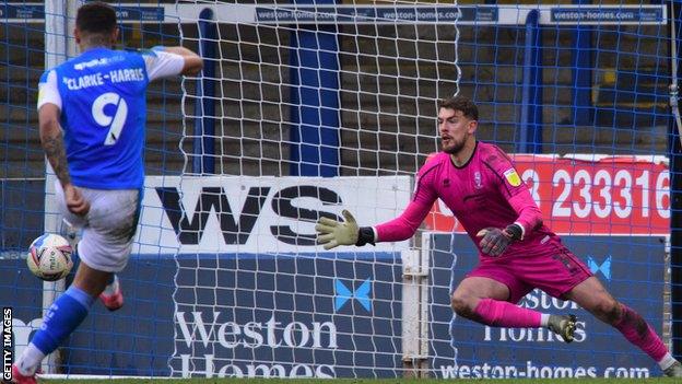 Alex Palmer (right) faces a penalty