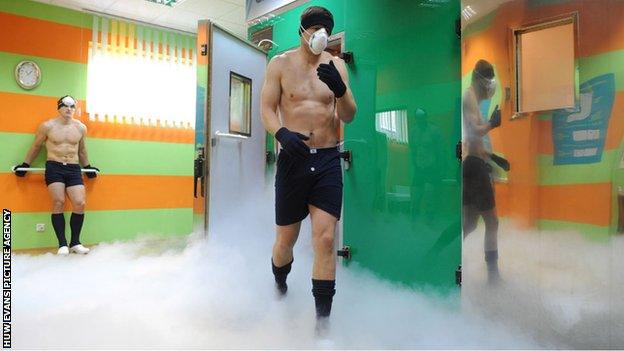 Wales players emerging from a cryotherapy chamber in Poland before the 2011 World Cup