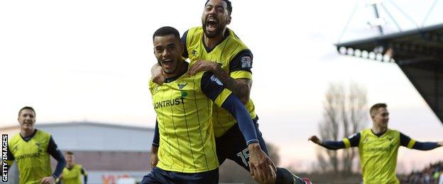 Curtis Nelson celebrates scoring Oxford's second goal