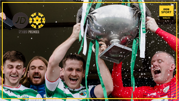 TNS players celebrate with the Cymru Premier trophy