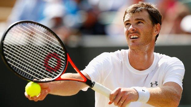 Jamie Murray in action at Wimbledon