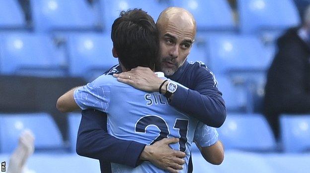 Manchester City boss Pep Guardiola and David Silva