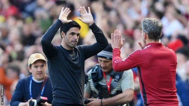 Mikel Arteta celebrates at the end of a match