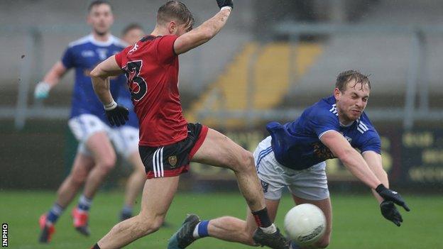 Cavan defender Padraig Faulkner made an important first-half block to deny Jerome Johnston