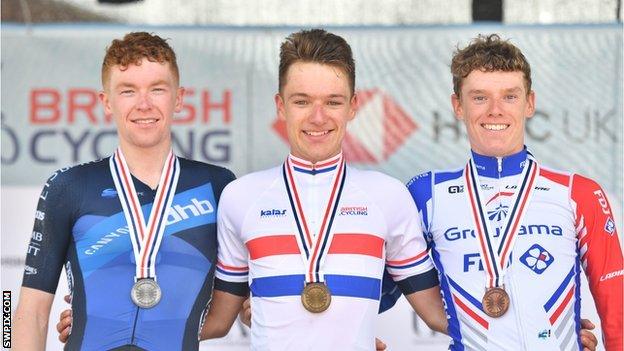 The podium finishers in the under-23 men road race