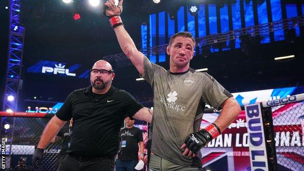 Brendan Loughnane celebrates his win over Ago Huskic