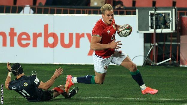 Duhan van der Merwe runs with the ball for the Lions