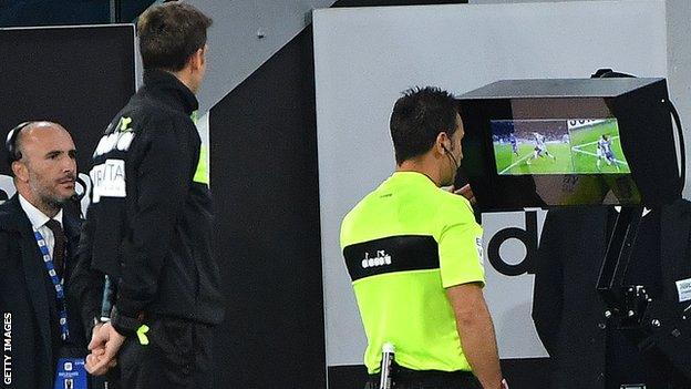 Referees in Italy's Serie A consult with TV replays to help with decision-making