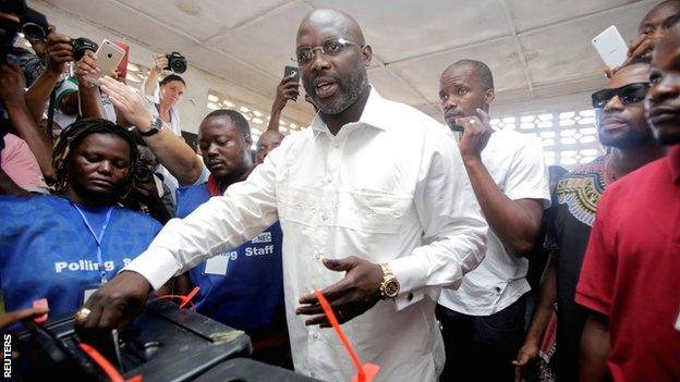 Presidential candidate George Weah casts his vote in last week's Liberian elections