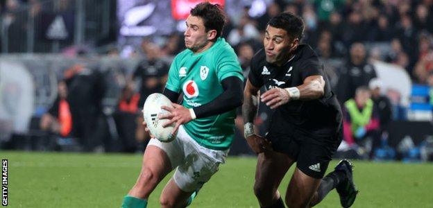 Rieko Ioane tackles Joey Carbery