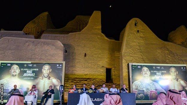 The news conference was held outdoors in Diriyah