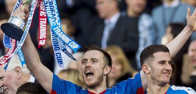 Rangers' Danny Wilson with the Petrofac Training Cup