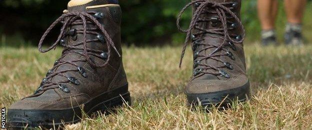 men's feet with walking shoes