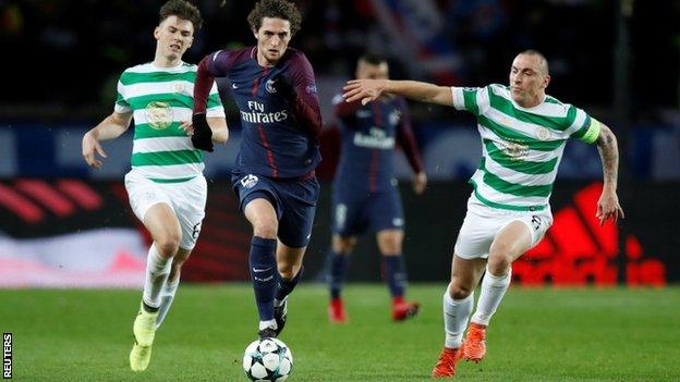 Scott Brown struggles to keep up with PSG's Adrien Rabiot