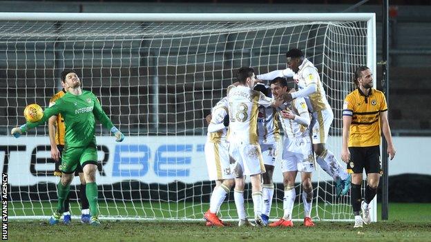 MK Dons players celebrate