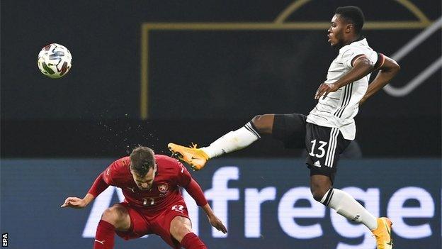 Wolfsburg's Bote Baku (right) was making his debut for Germany against Czech Republic