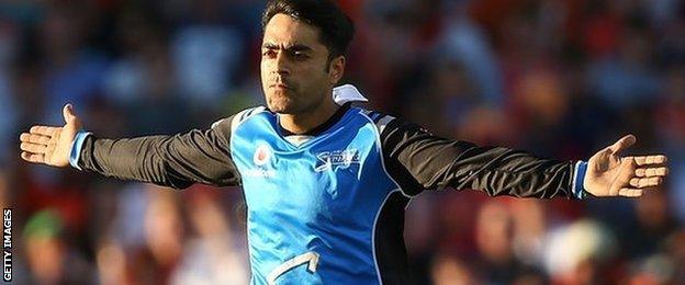 Rashid Khan celebrates a wicket