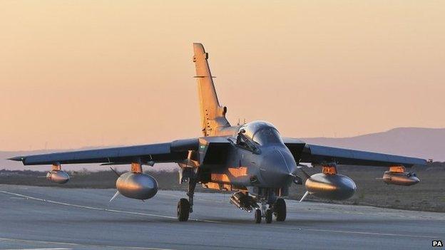 Handout photo dated 01/10/14 issued by the Ministry of Defence of a RAF Tornado GR4 returning to RAF Akrotiri in Cyprus