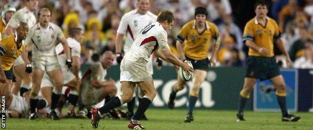 Jonny Wilkinson kicks a drop goal in the last minute to win the World Cup for England in 2003