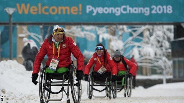 Athletes arriving at the Paralympic village