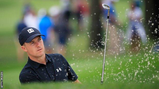 Jordan Spieth plays a shot out of a bunker