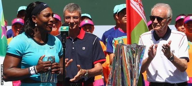 Moore (far right) applauds Williams after her win at Indian Wells at the weekend