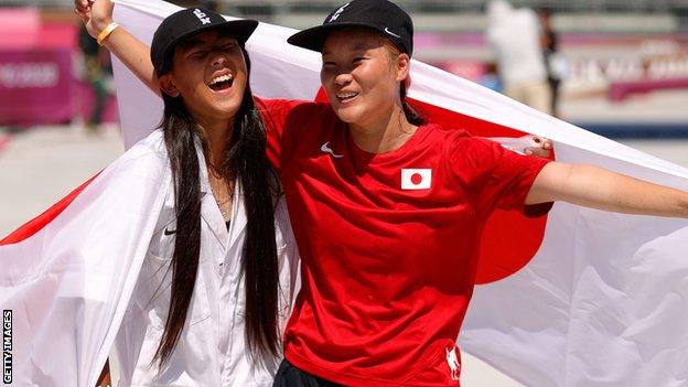 Sakura Yosozumi of Team Japan and Kokona Hiraki celebrate after winning the gold and silver medals