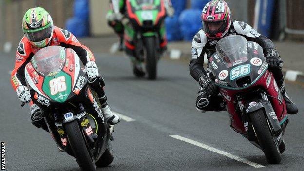 Derek McGee leads Adam McLean in the Supertwins class on his way to his second victory of the day