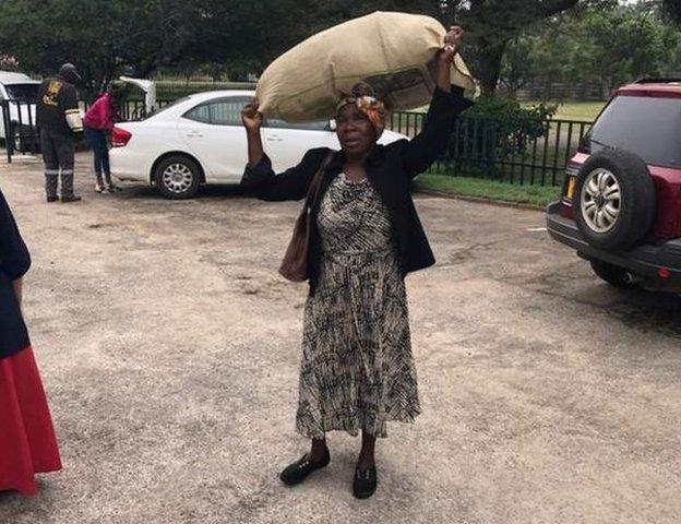 Donation woman in Harare