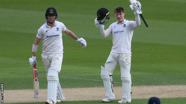 Tom Alsop celebrates scoring a century