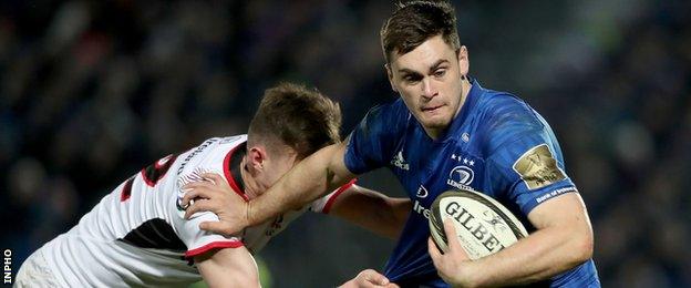 Leinster centre Conor O'Brien is tackled by Ulster's James Hume