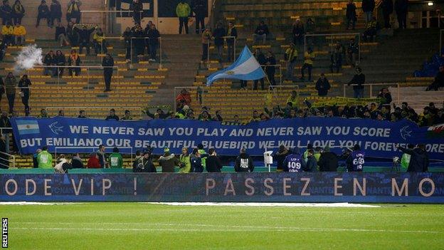 A Cardiff banner reading: "We never saw you play and never saw you score but Emiliano our beautiful bluebird we will love you forever more."