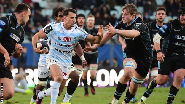 Glasgow lock Jonny Gray tackles Racing wing Juan Imhoff