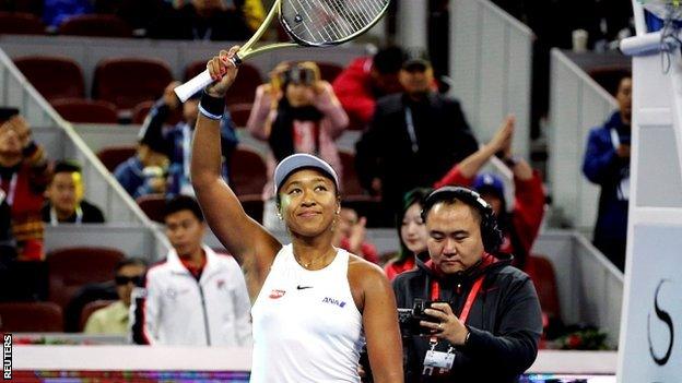 Naomi Osaka celebrates winning the 2019 China Open