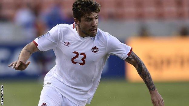 Michael Petrasso dribbles with the ball