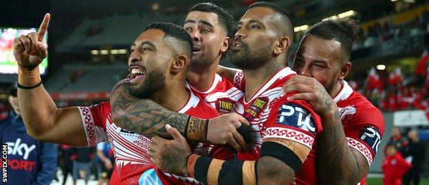 Tonga players celebrate their win in New Zealand