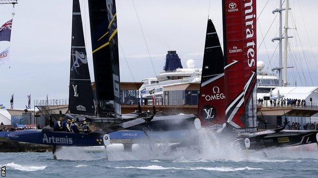 Emirates Team New Zealand crosses the finish just ahead of Artemis Racing