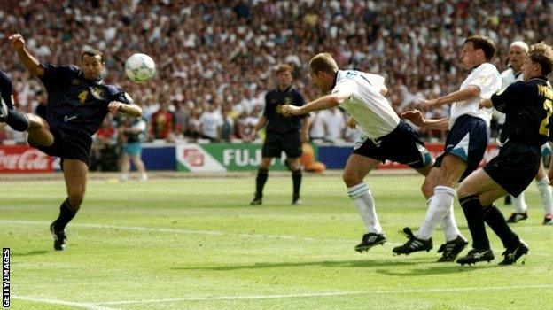 Alan Shearer scores England's first goal against Scotland