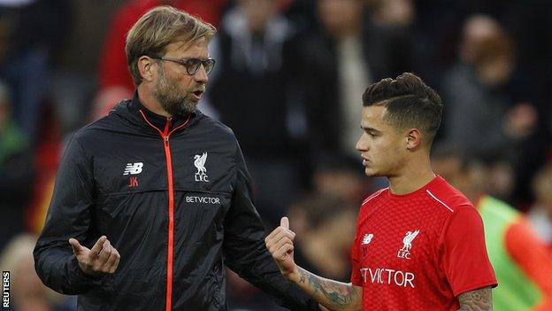 Liverpool manager Jurgen Klopp (left) and Reds playmaker Philippe Coutinho