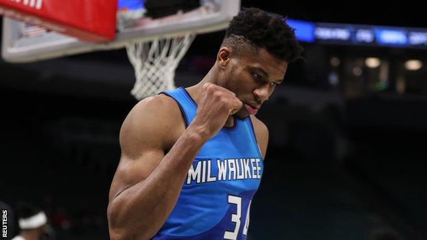 Giannis Antetokounmpo celebrates