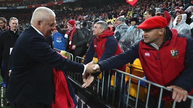 Warren Gatland shakes hands with a Lions fan